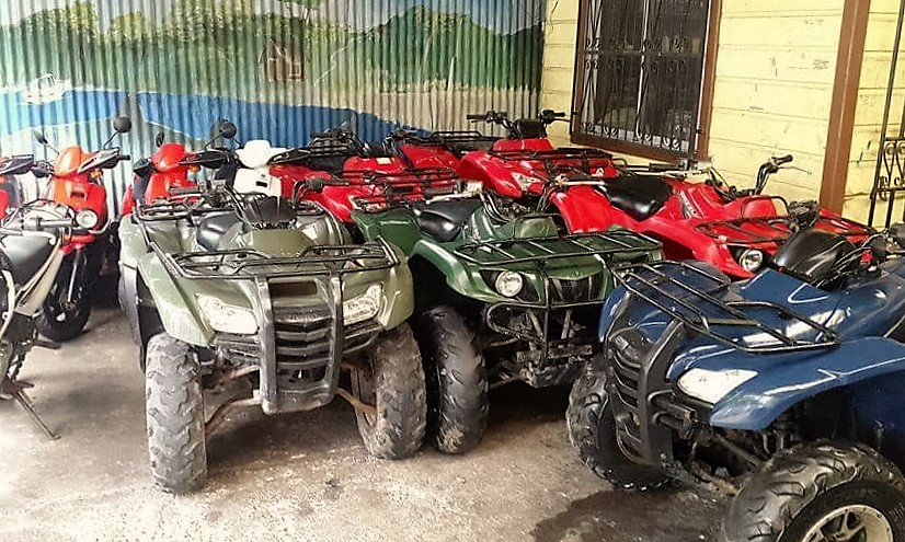 Rooneys Rentals Quads, Motos and Golf Carts in Utila