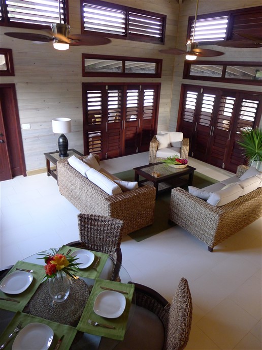 Hummingbird House has direct access to the beach at Coral Beach Village