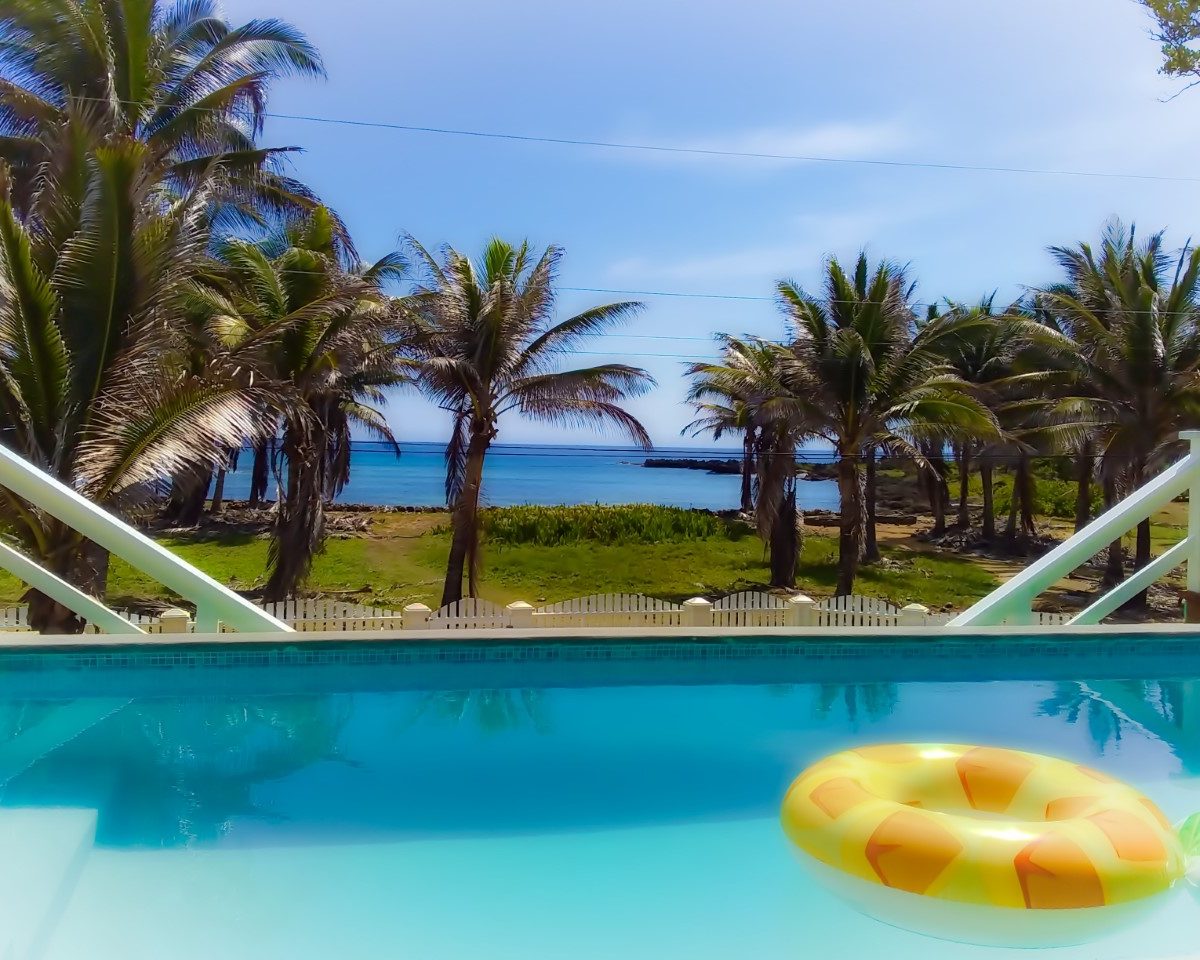 Newly constructed 2 bedroom with attached apartment on Paradise Cove in the exclusive Trade Winds neighborhood. Bright, clean colors expertly coordinated will keep you firmly in the Caribbean vibe.